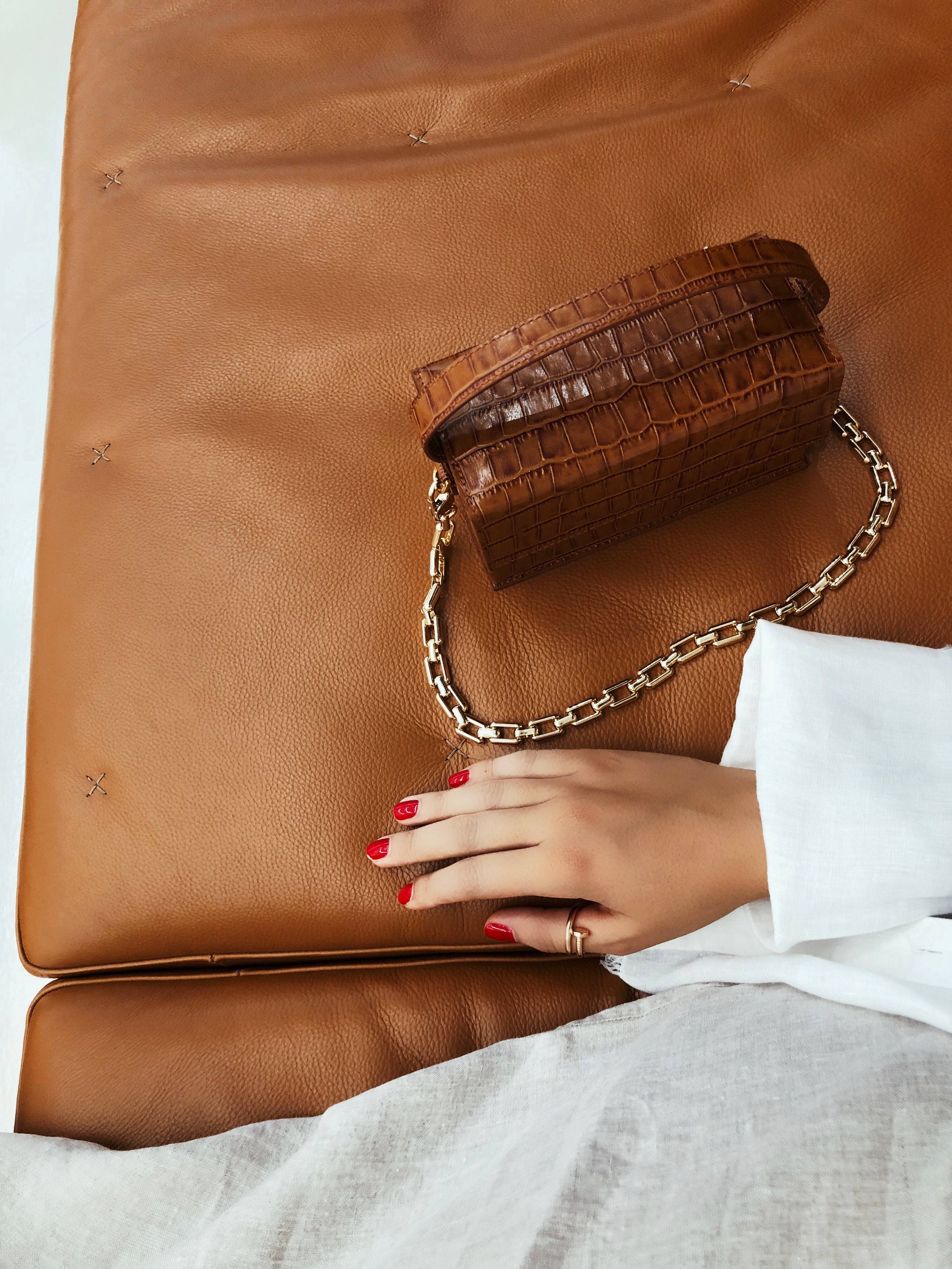 Caramel clutch bag outlet